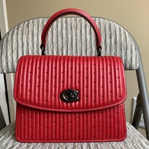 Coach parker top handle bag quilting and rivets
